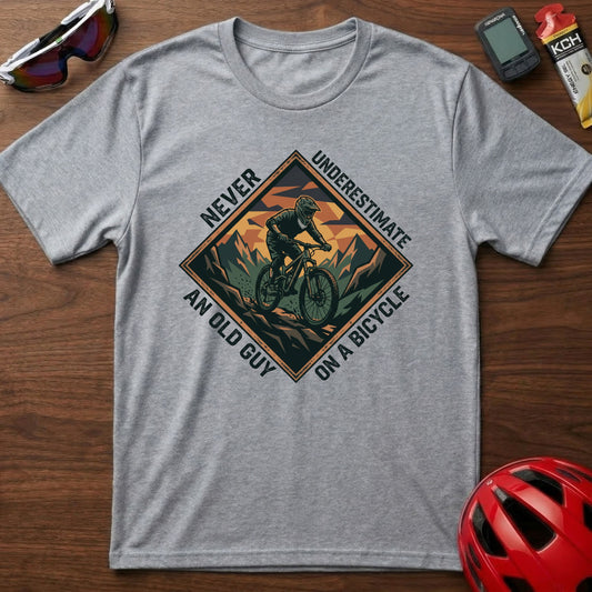 Never Underestimate an Old Guy on a Bicycle T-Shirt — Vintage Mountain Biking Tee for Cyclists & Outdoor Dads