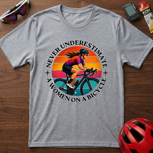 Never Underestimate A Woman On A Bicycle T-Shirt — Retro Cycling Tee for Women